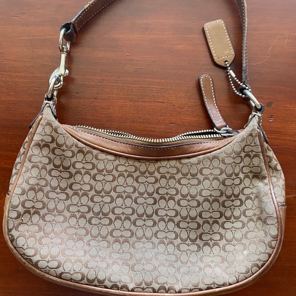 Small signature coach purse.